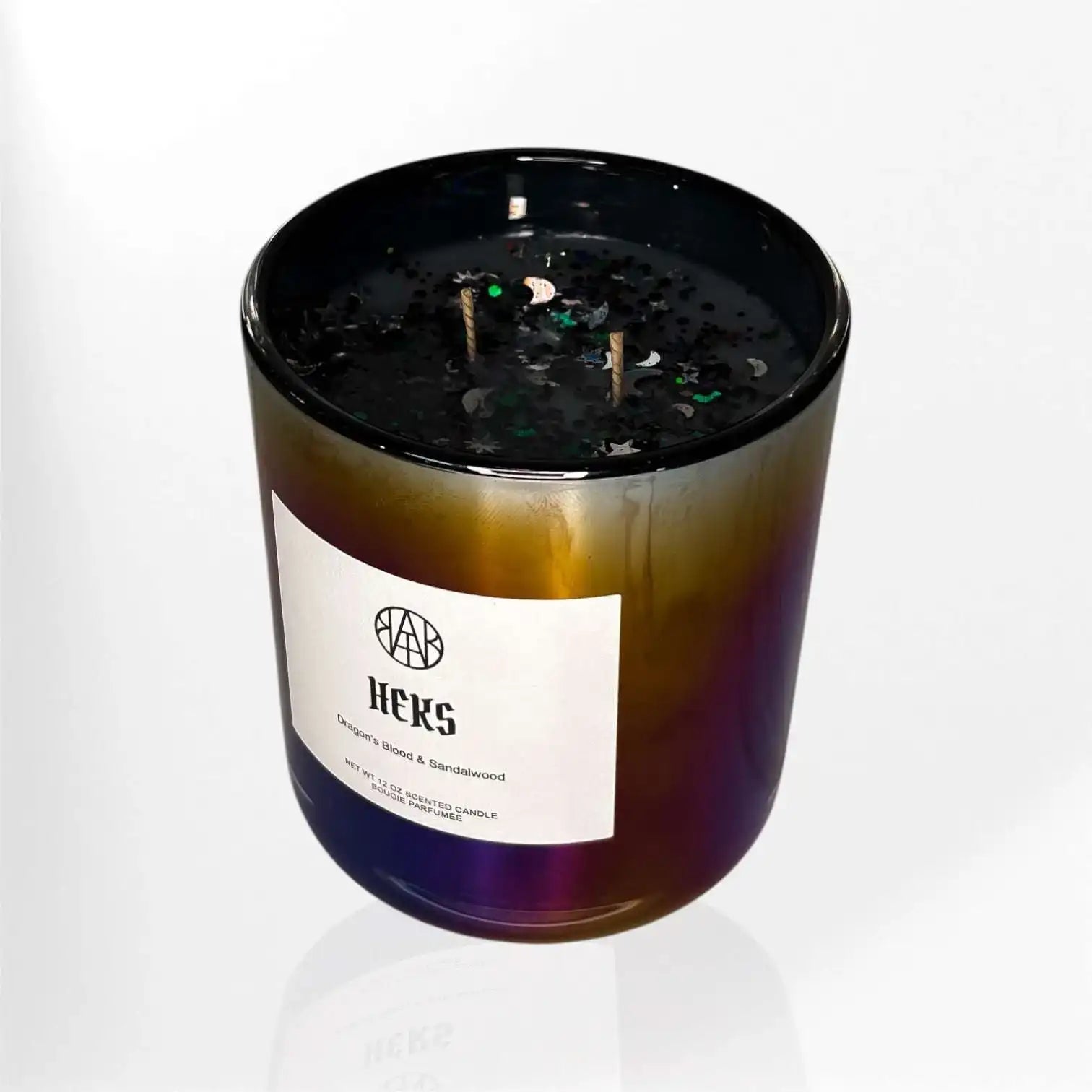 AEMBR HEKS candle in iridescent glass jar with black wax, dragon's blood and sandalwood scent