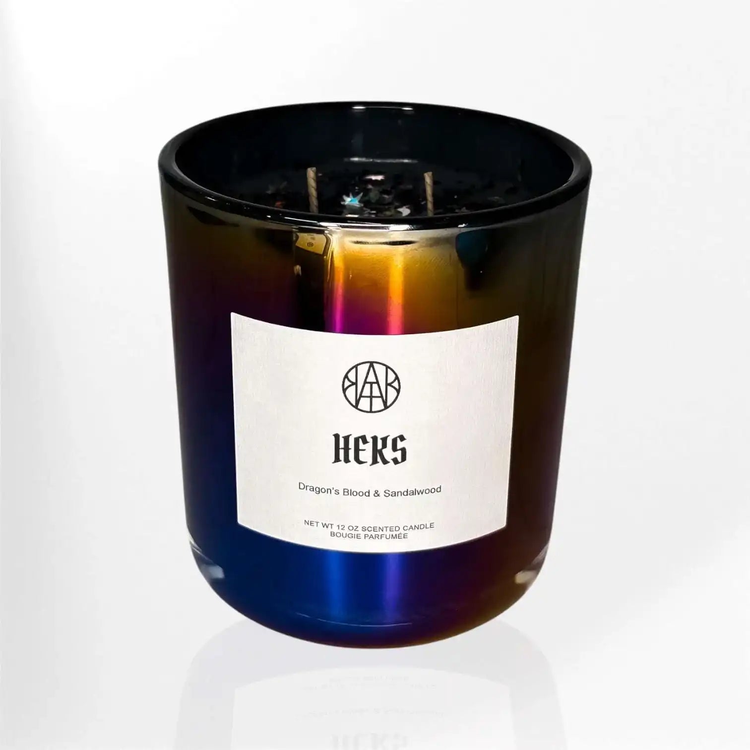 AEMBR HEKS scented candle Dragon's Blood & Sandalwood in iridescent glass jar on white background