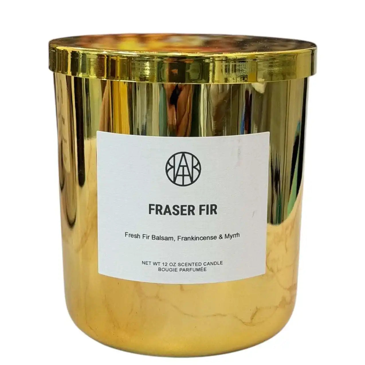 AEMBR Fraser Fir gold candle jar with label, featuring fresh fir balsam, frankincense, and myrrh.