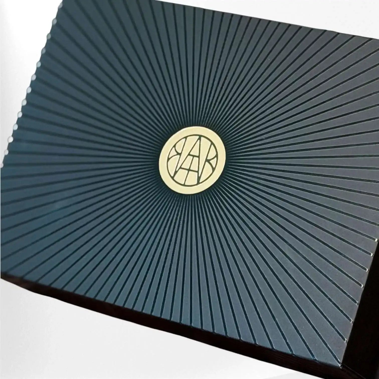 Eco-friendly non-toxic gift box with gold sunburst pattern, premium home essentials packaging