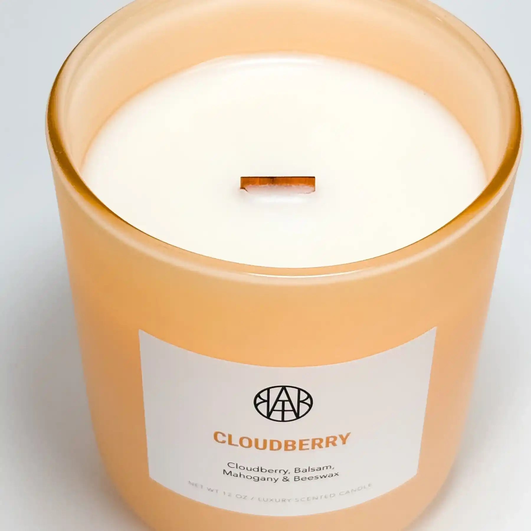 Non-toxic Cloudberry scented candle in frosted glass jar with wooden wick