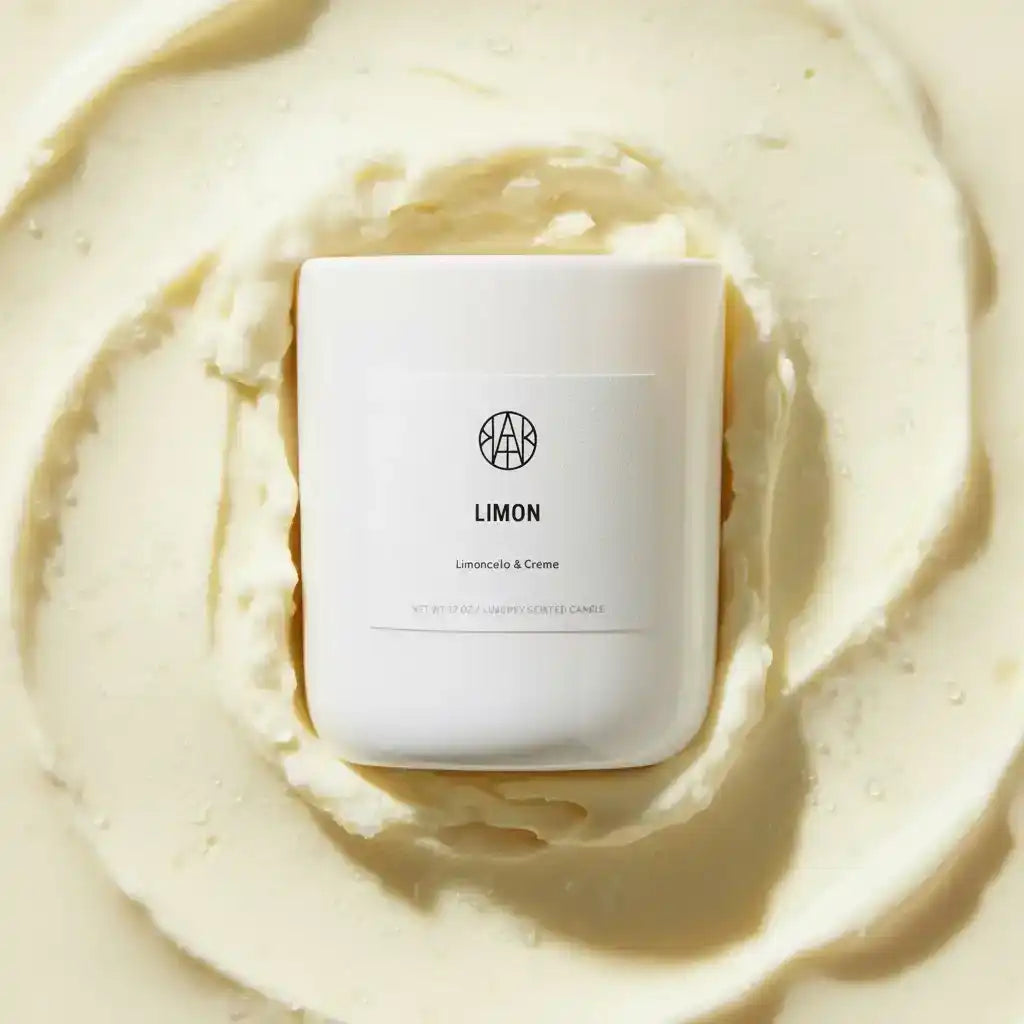 AEMBR Limon limoncello & crème scented candle on creamy swirled background