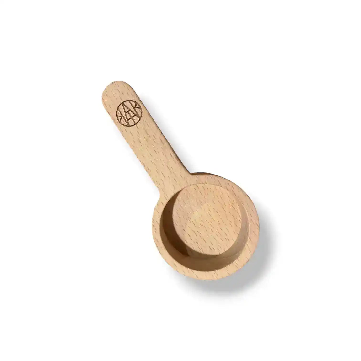 AEMBR laundry scoop in a natural beige color, designed for easy and precise laundry detergent measurement.