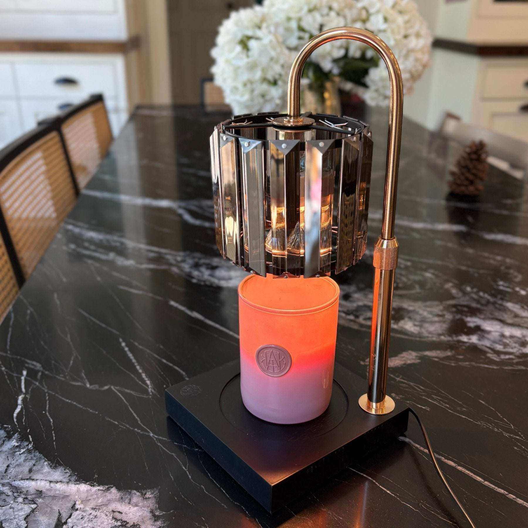AEMBR Deco Candle Warmer with sleek design, used to safely warm candles and release fragrance without a flame.