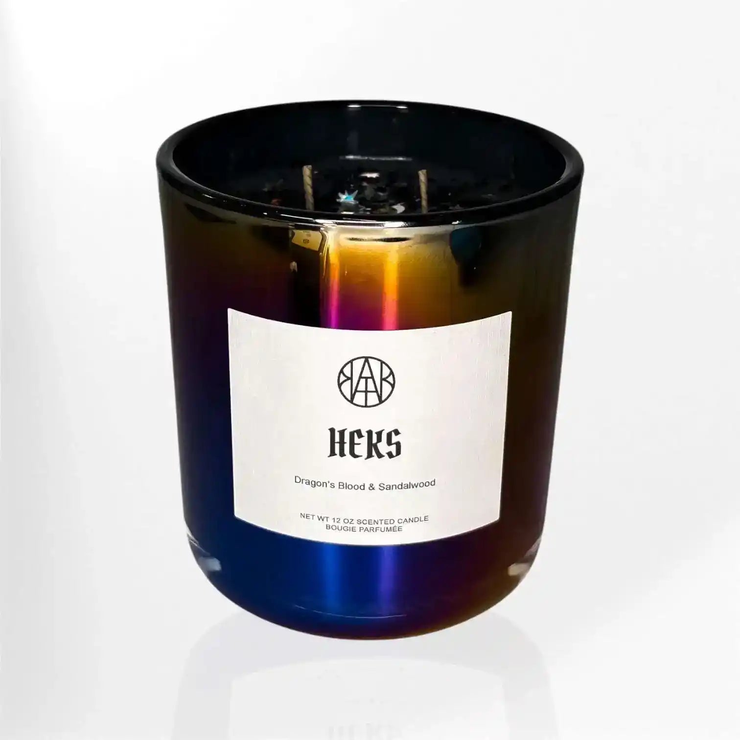 AEMBR Heks Candle featuring a sleek, modern design with a matte black finish, perfect for cozy home decor.
