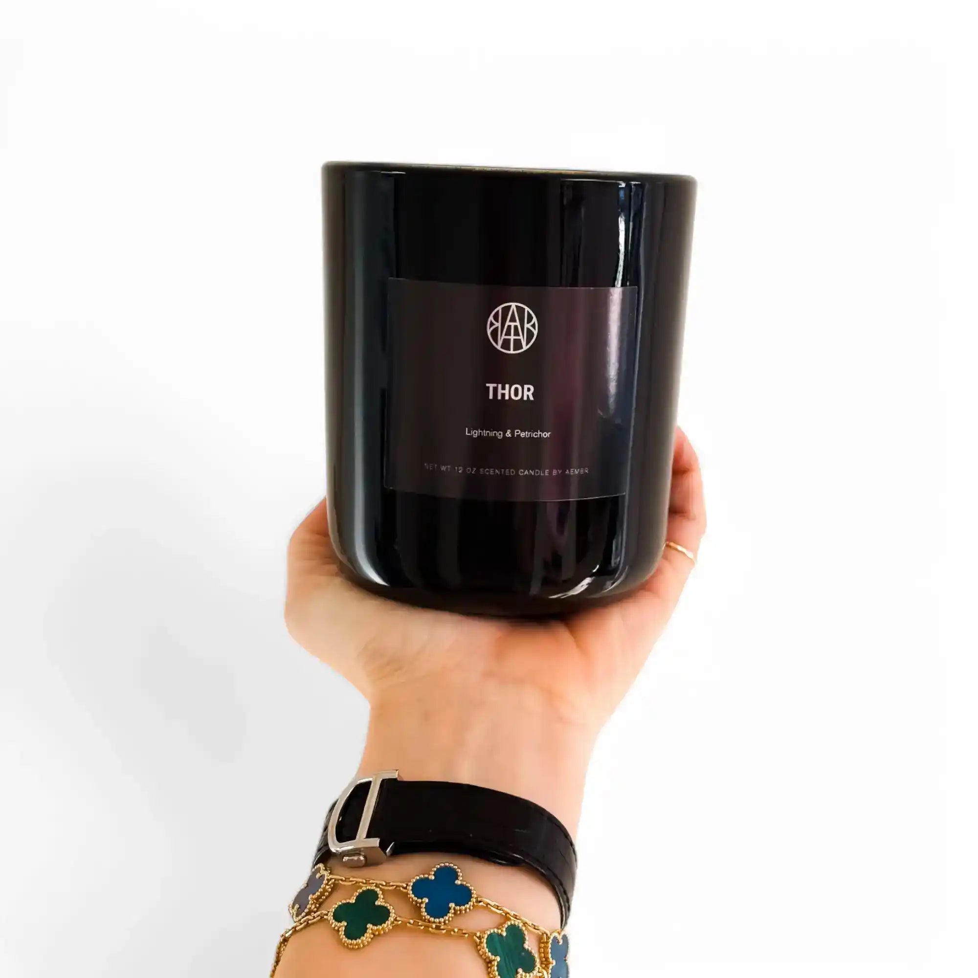 AEMBR Thor Candle with a dark, textured surface and intricate design, ideal for home decor and ambient lighting.