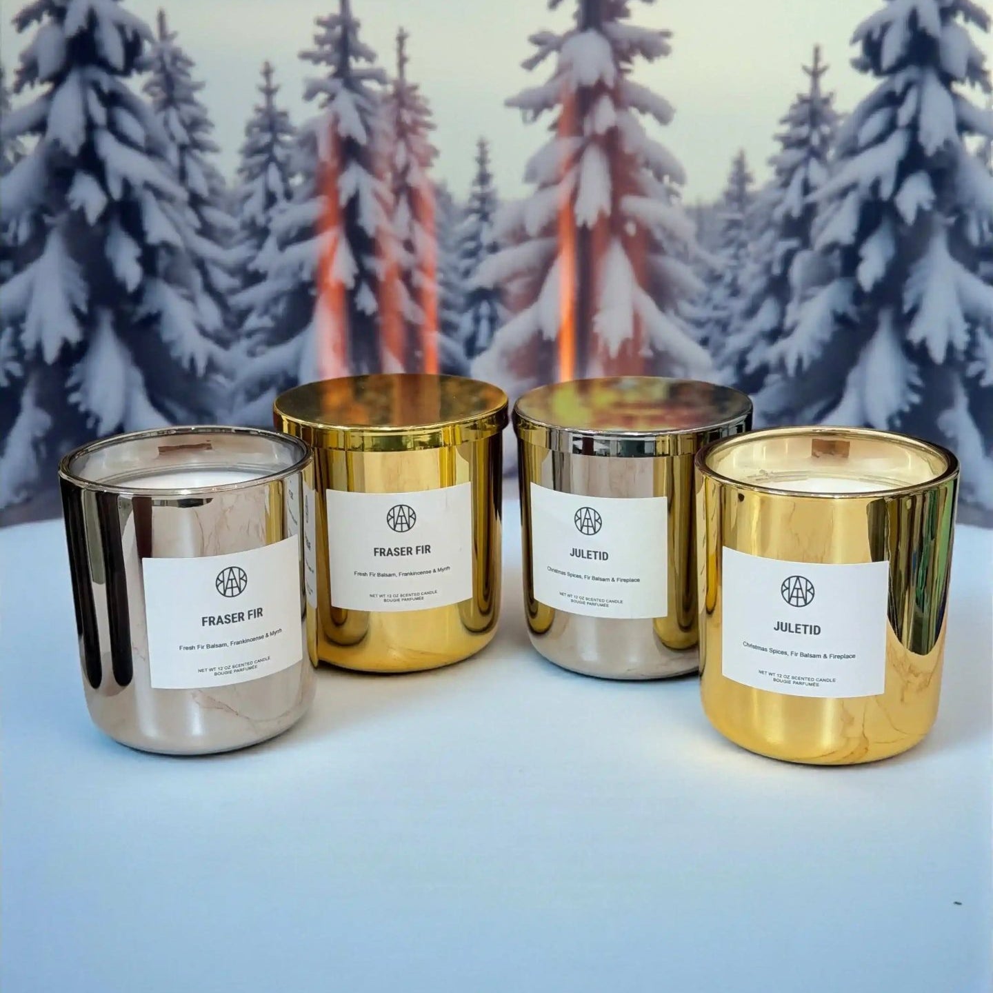 AEMBR Fraser Fir candles in Silver and Gold Editions, featuring festive candle designs with silver and gold accents.