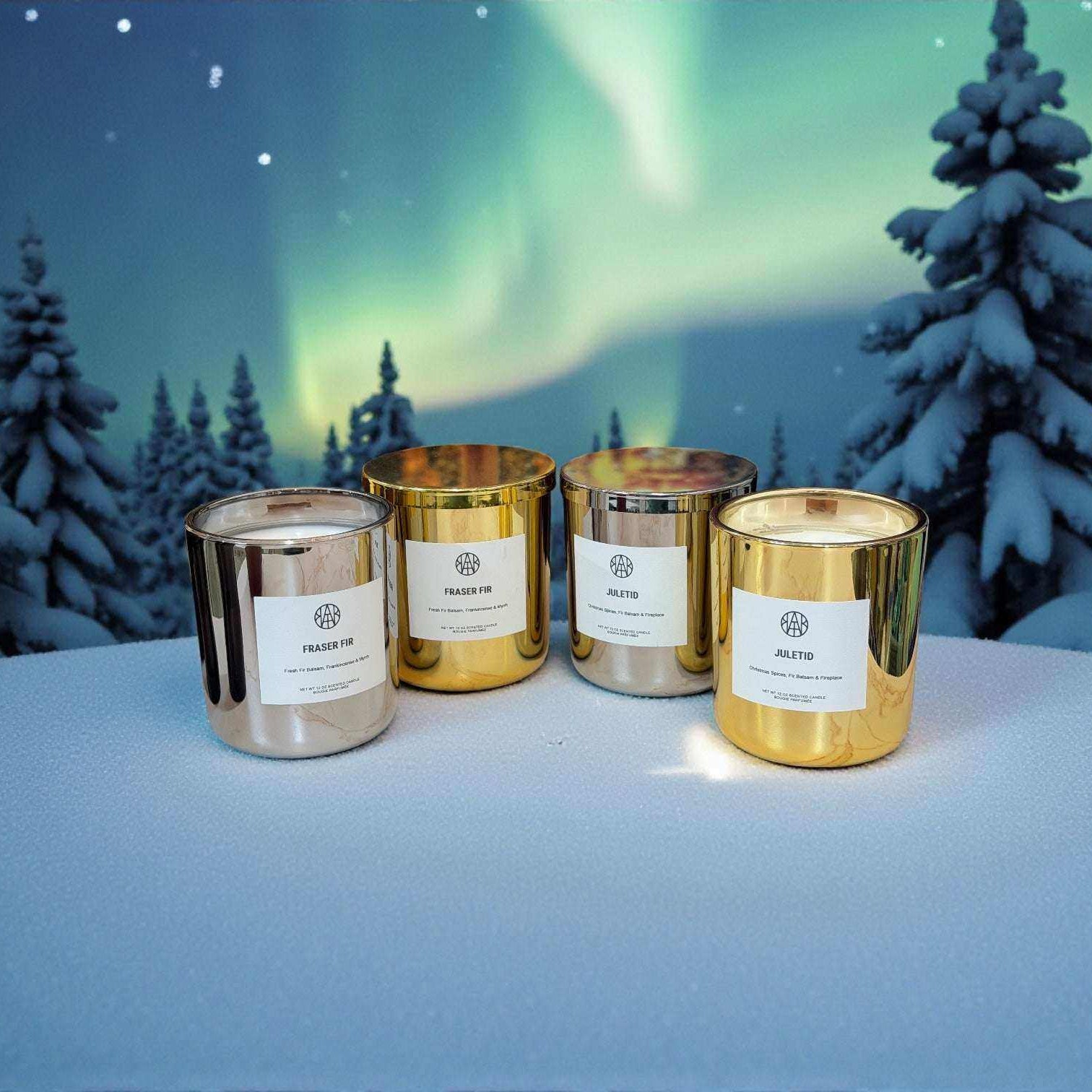 AEMBR Fraser Fir candles in Silver & Gold Editions with festive green and metallic accents, perfect for holiday decor.