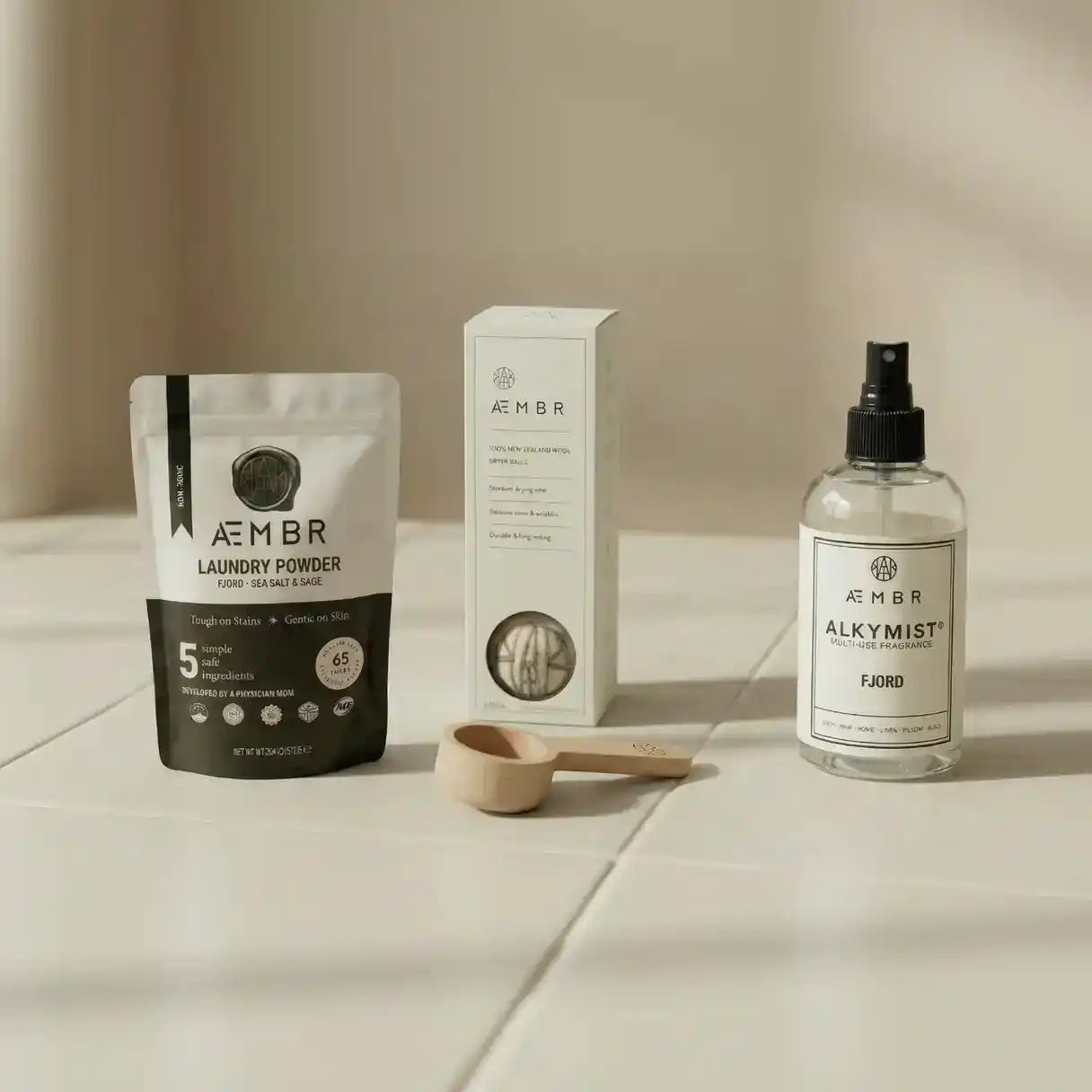 AEMBR Fjord Lovers Air & Laundry Care Bundle with laundry detergent, fabric freshener, and scent boosters for fresh clothes.