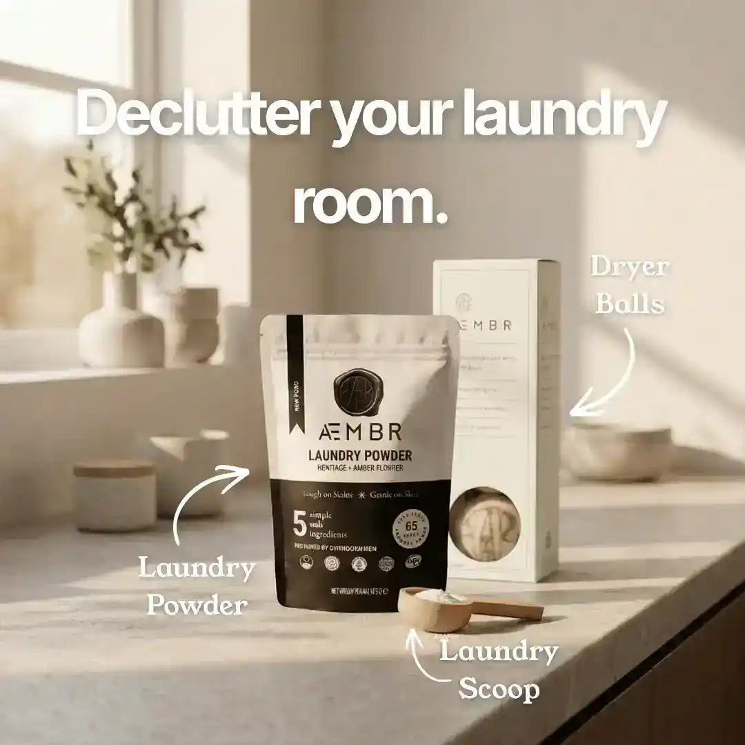 AEMBR laundry detergent bundle with detergent, dryer balls, linen spray, and scent options in a natural laundry kit.