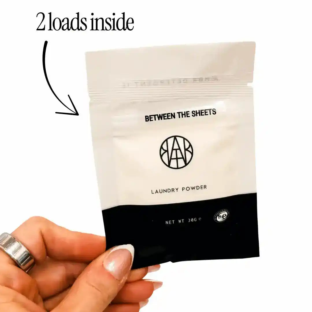 AEMBR Autumn Wax Melt Bundle with free laundry scent, featuring assorted warm-toned wax melts in a clear container.