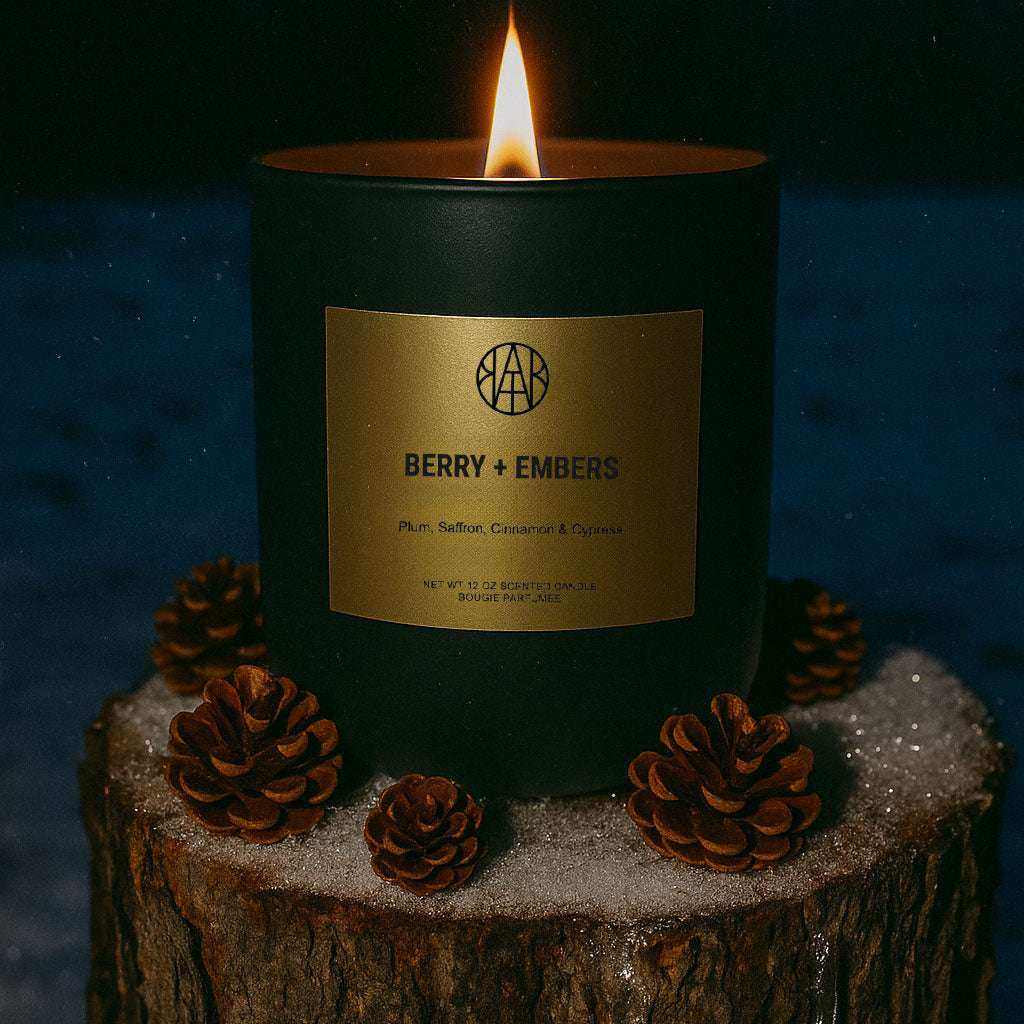AEMBR Berry + Embers wax melts in a clear plastic package, showcasing vibrant wax pieces with berry and ember scent themes.