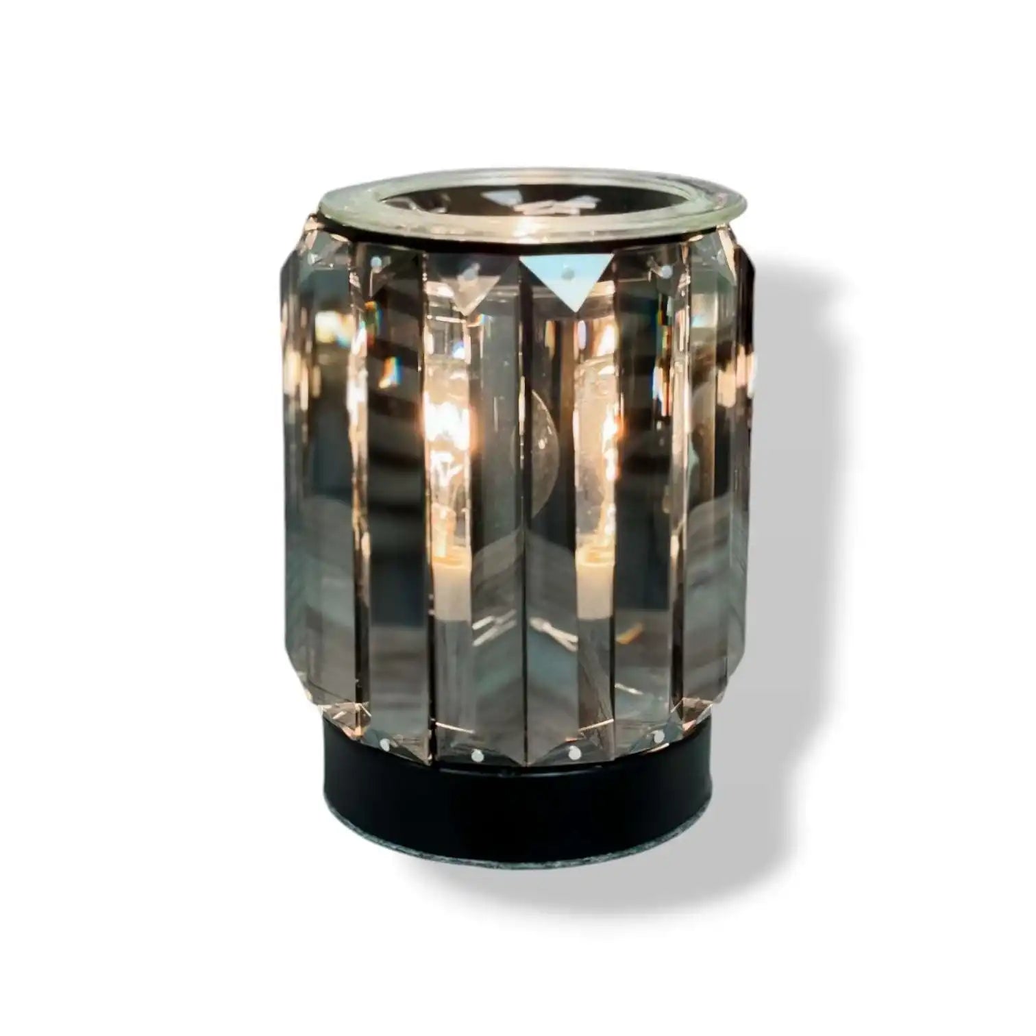 AEMBR decorative crystal wax warmer with reflective facets on a black base, illuminated