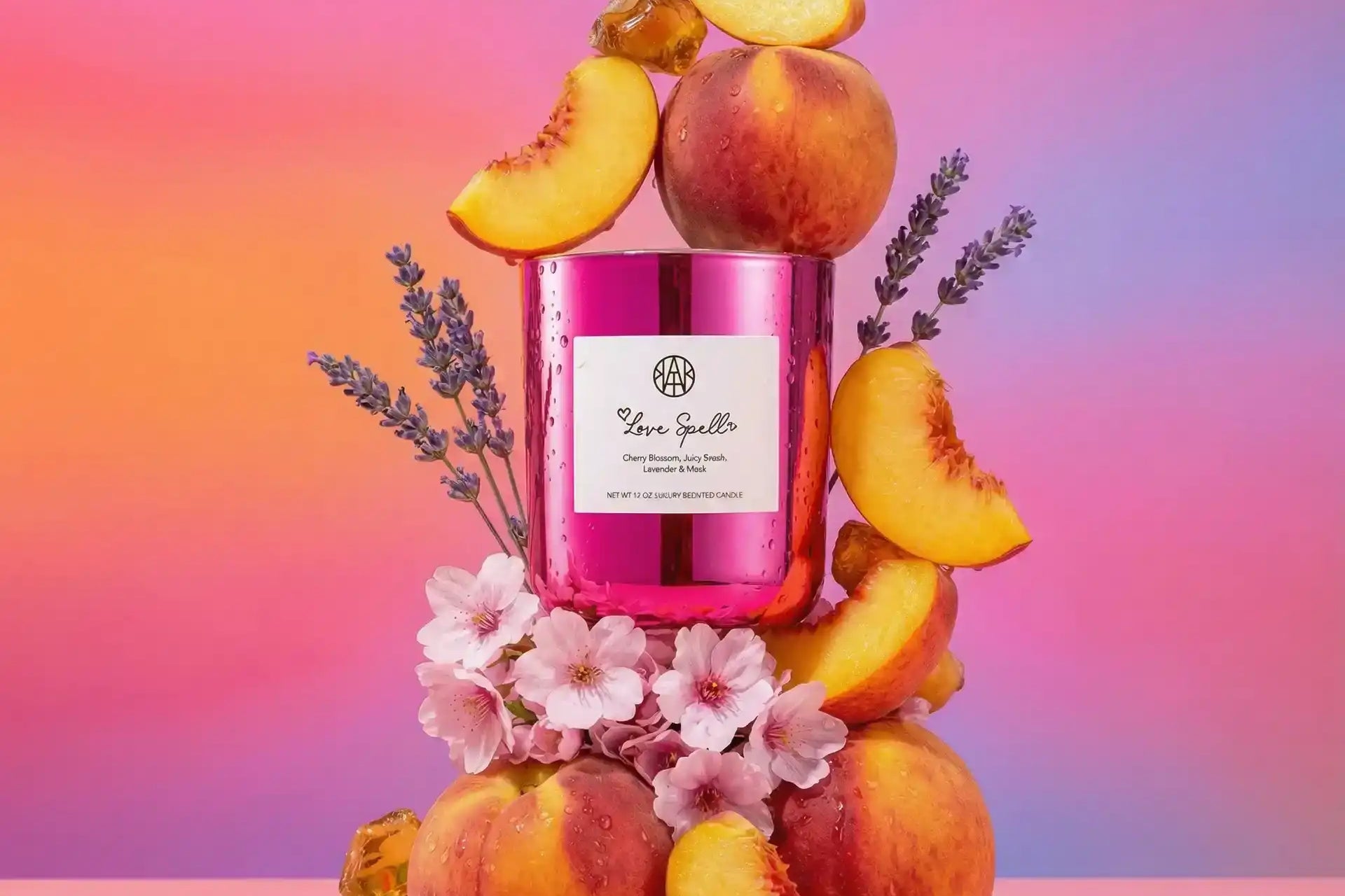 AEMBR pink candle with peaches, flowers, lavender and honey on a pastel gradient background