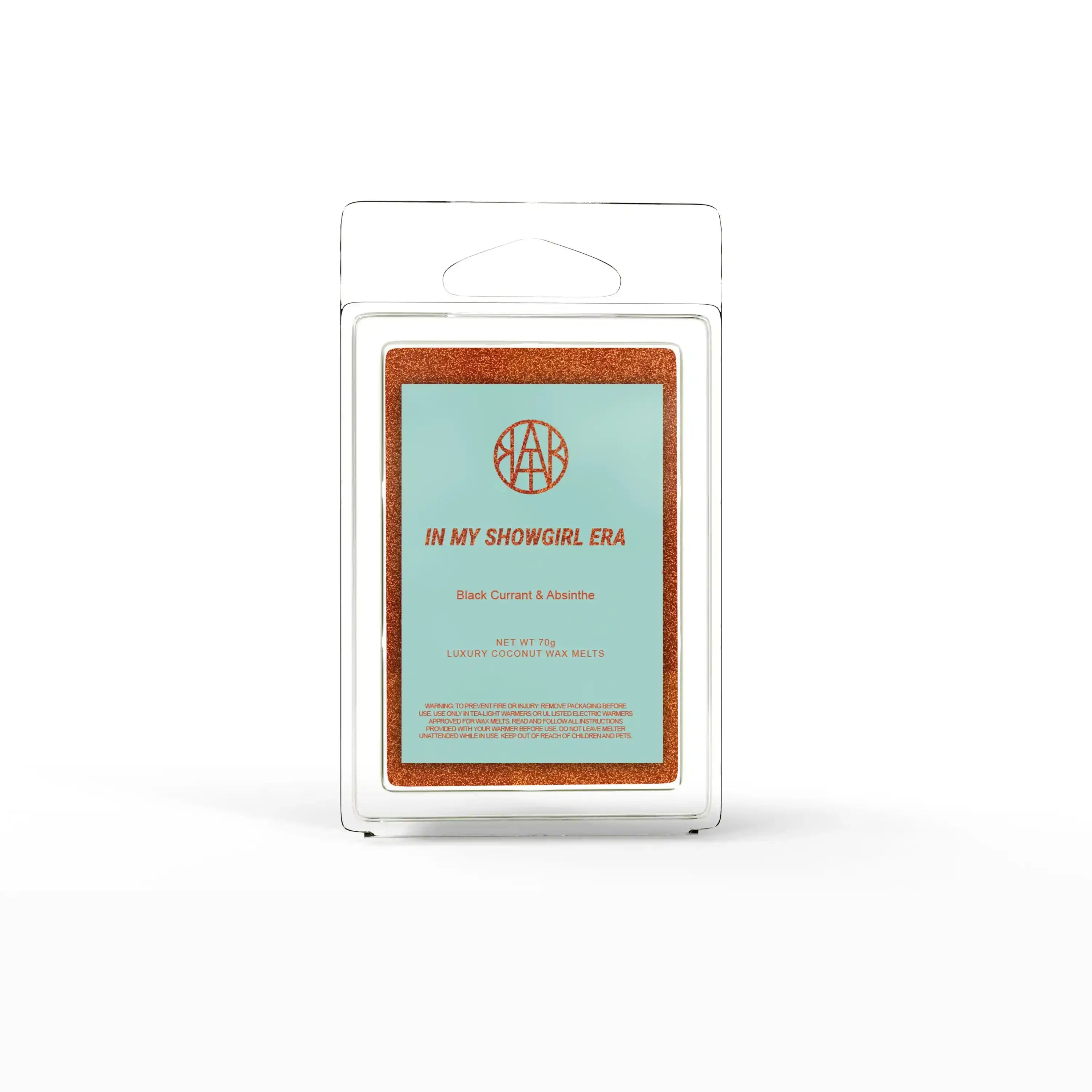 AEMBR In My Showgirl Era luxury coconut wax melts in clamshell packaging, black currant & absinthe scent.