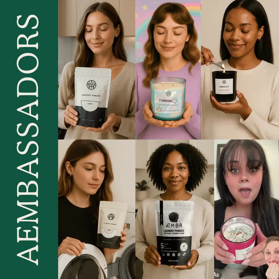 Women holding non-toxic candles and laundry detergent powders, smiling in home setting.