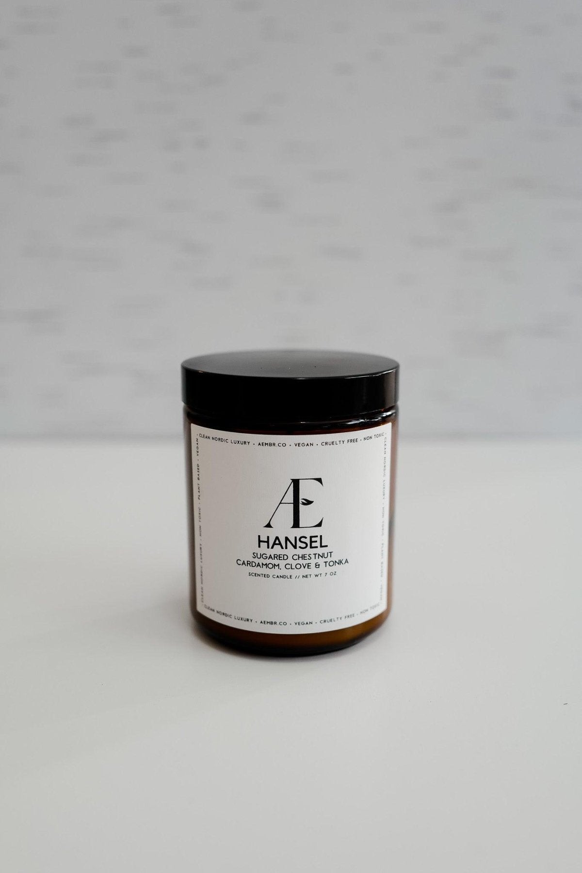Non-toxic sugared chestnut candle with cardamom clove tonka, brown jar, minimalist label