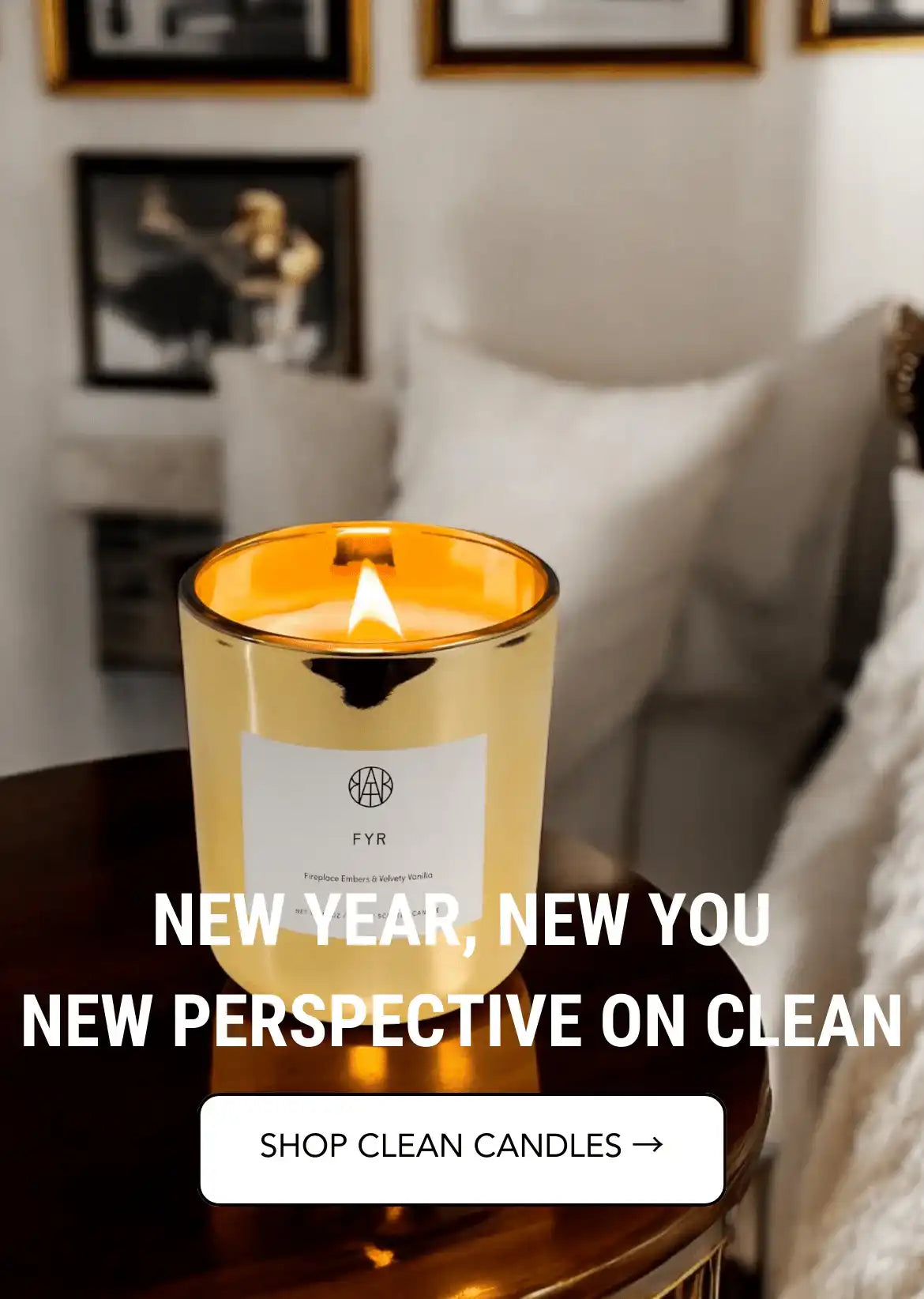 AEMBR gold candle burning on a table in cozy room, promoting non-toxic clean candles.