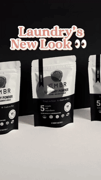 Non-toxic laundry detergent powder pouches displayed with 'Laundry’s New Look' text.