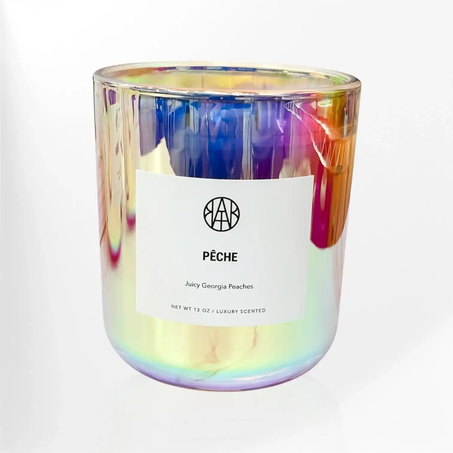 AEMBR luxury scented candle in iridescent glass jar labeled PÊCHE Juicy Georgia Peaches