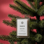 AEMBR Fraser Fir wax melts hanging on fir tree with red background, non-toxic home fragrance.