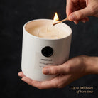 AEMBR The Viking Lavender Haze candle with a frosted glass jar and lavender-colored wax, perfect for relaxing ambiance.
