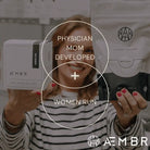 Woman holding AEMBR laundry powder and coconut wax candle, highlighting physician mom developed and women-run.