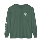 Green long sleeve shirt with white logo on chest and AEMBR text on sleeve, non-toxic apparel