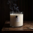 AEMBR Valkyrie Bibliotek candle with intricate design, white wax, and wick, ideal for decorative or ambient lighting.