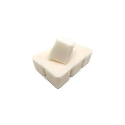 Non-toxic soy wax melts in individual cubes on white background