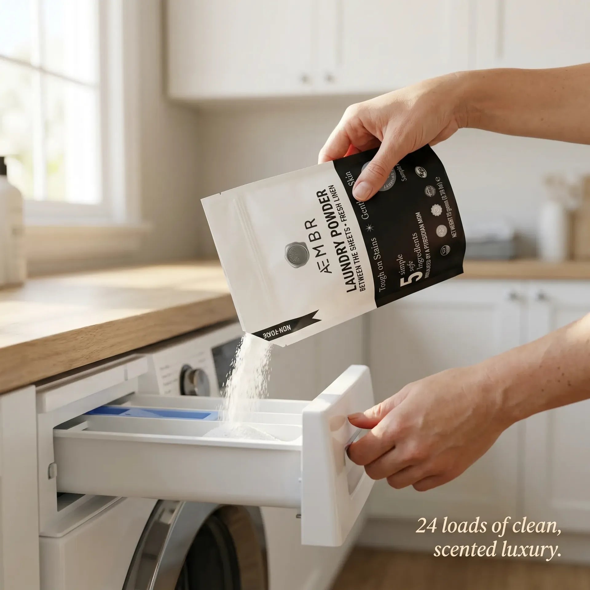 AEMBR laundry powder scent sampler pack featuring small sample bottles of various fragrances in a compact laundry bundle.