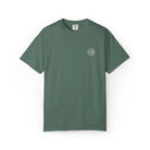 AEMBR green t-shirt with white circular logo, minimalist design on plain background