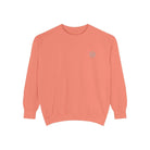 AEMBR coral crewneck sweatshirt with small embroidered logo on chest, displayed on white background.
