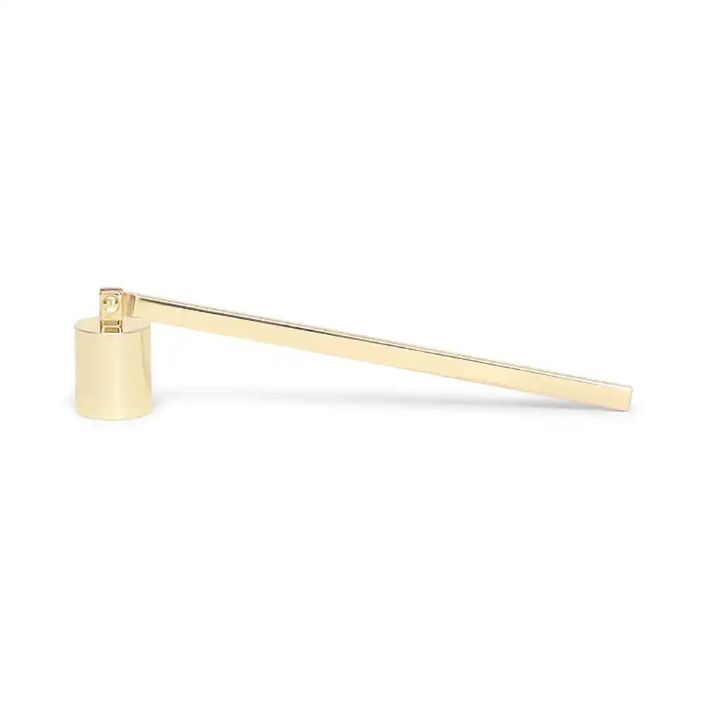 Gold non-toxic candle snuffer for safe candle extinguishing on white background