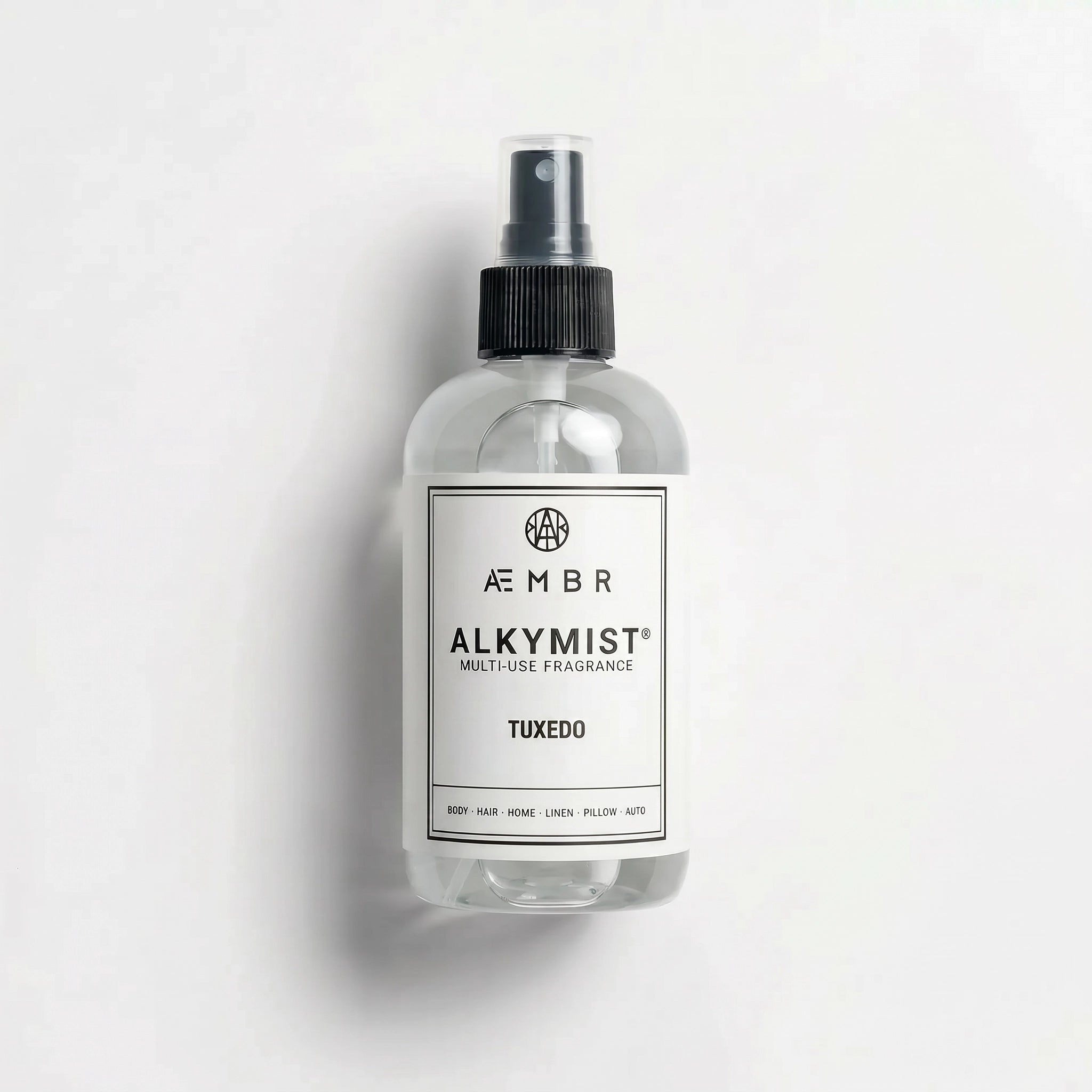 Alkymist® Tuxedo Room Spray by AEMBR, multi-use fragrance bottle with sleek black design and elegant labeling.
