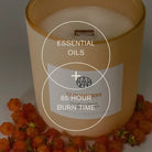 AEMBR Cloudberry candle with essential oils, surrounded by fresh cloudberries, 85 hour burn time.