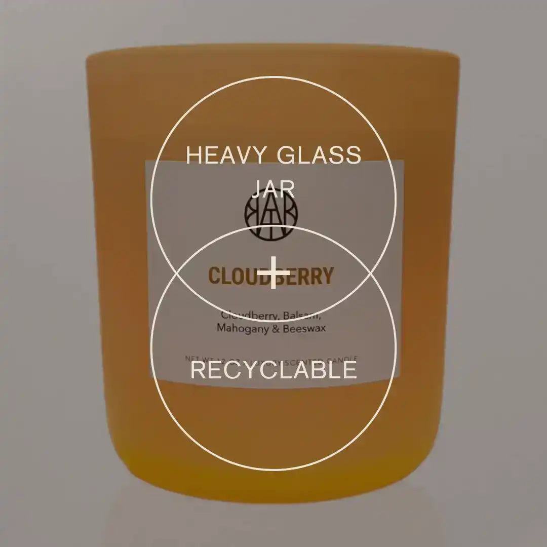AEMBR Cloudberry candle in a heavy glass, recyclable jar with label, home fragrance product