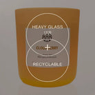 AEMBR Cloudberry candle in a heavy glass, recyclable jar with label, home fragrance product