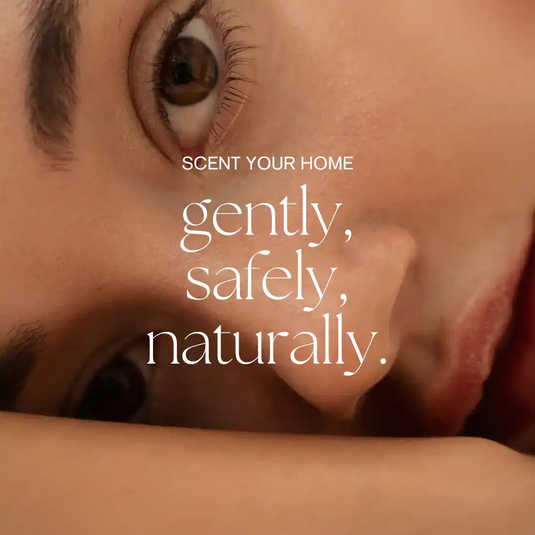 Close-up of a woman's face with AEMBR non-toxic home scenting message overlaid.
