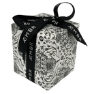 AEMBR gift box with floral black-and-white design and branded ribbon