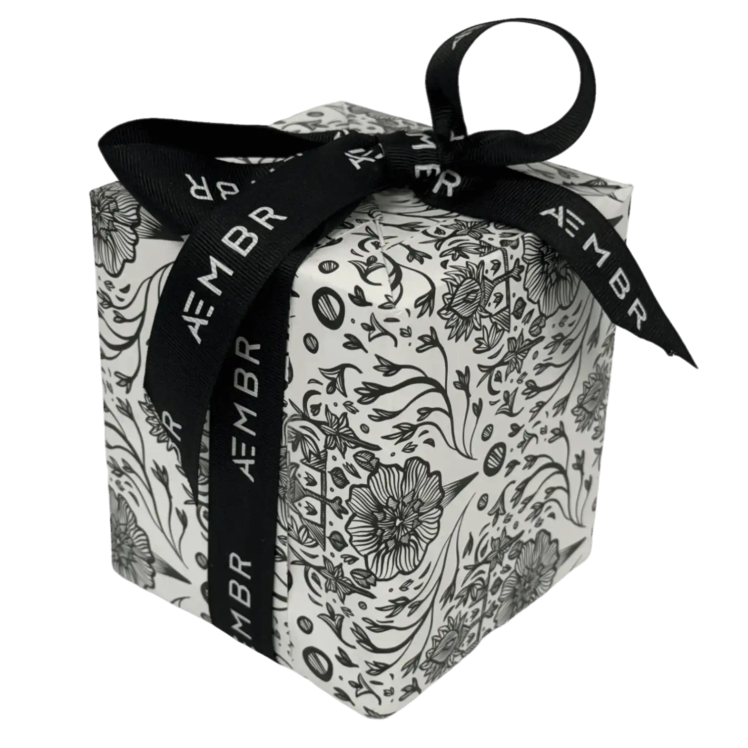 AEMBR gift box with floral black-and-white design and branded ribbon