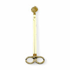 AEMBR gold candle wick trimmer tool on white background, non-toxic home essentials