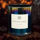 AEMBR Practical Magic cinnamon and patchouli luxury candle in iridescent glass, moody backdrop