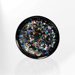 AEMBR round black tray with colorful star and moon confetti, non-toxic home decor accessory.