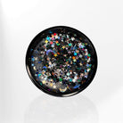 AEMBR black candle lid with colorful star and moon confetti on white background