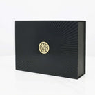 AEMBR black gift box with gold logo, premium packaging for non-toxic home products