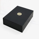 AEMBR luxury black gift box with gold logo on white background