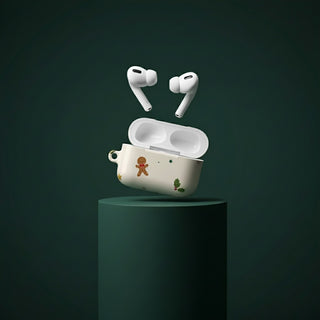Wireless earbuds with a decorated case on a dark green background