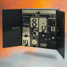 Luxury AEMBR Advent Calendar 2025 with festive design and numbered compartments for daily holiday surprises.