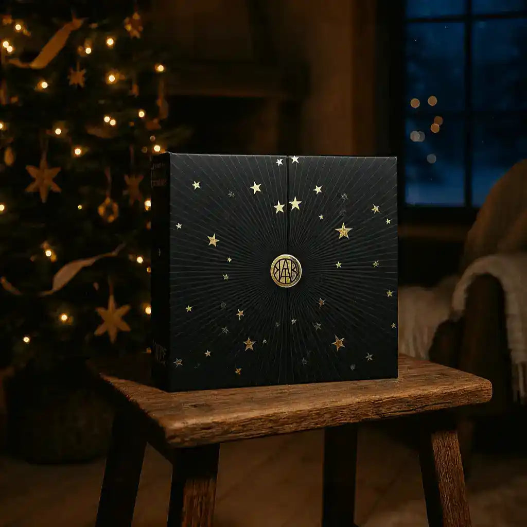 Luxury Advent Calendar 2025 by AEMBR featuring festive compartments and elegant design for holiday countdown.